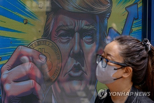 홍콩의 한 가상화폐 거래소 벽에 그려진 그림[로이터 연합뉴스 자료사진]